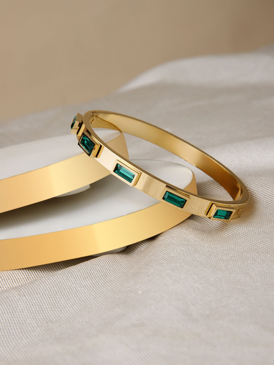 Luxe Gold-Plated Bangle with Emerald Green Accents